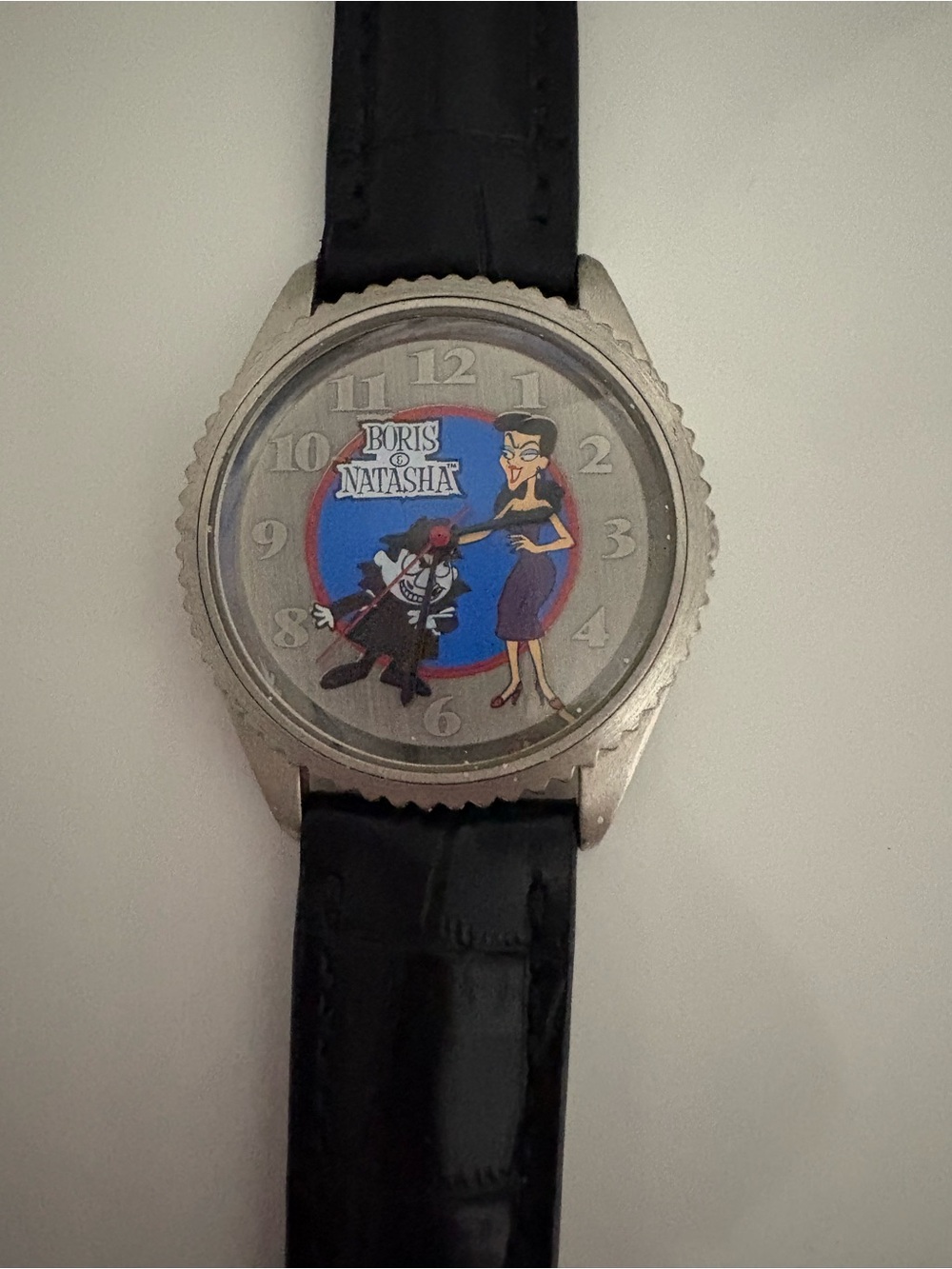 The Limited Black Strap Watch with Blue and Red Cartoon Dial